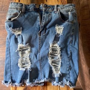 American Bazi. Distressed blue Jean skirt.